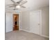 A bedroom featuring plush carpet, neutral paint, and a ceiling fan at 1303 Hill Se St, Atlanta, GA 30315
