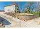 Wide driveway featuring stone retaining wall and plenty of parking at 1303 Hill Se St, Atlanta, GA 30315
