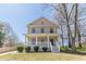 Charming two-story home with a welcoming front porch and well-maintained lawn at 1303 Hill Se St, Atlanta, GA 30315