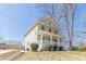 Beautiful two-story home featuring a classic front porch and landscaped front yard at 1303 Hill Se St, Atlanta, GA 30315