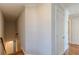 Hallway with staircase and hardwood floors and storage closet at 1303 Hill Se St, Atlanta, GA 30315