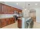 Charming kitchen boasts stainless appliances, granite countertops, and ample wood cabinetry at 1303 Hill Se St, Atlanta, GA 30315