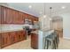 Modern kitchen with stainless steel appliances, dark wood cabinets and granite countertops at 1303 Hill Se St, Atlanta, GA 30315