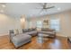 Spacious living room featuring a comfortable gray sectional and bright windows at 1303 Hill Se St, Atlanta, GA 30315