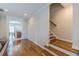 Open-concept living space with hardwood floors, and easy access to other living spaces at 1303 Hill Se St, Atlanta, GA 30315