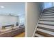 Open concept living room with ceiling fan and hardwood floors at 1303 Hill Se St, Atlanta, GA 30315