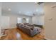 Bright living room with hardwood floors, natural light, and a large sectional sofa at 1303 Hill Se St, Atlanta, GA 30315