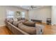 Comfortable living room with hardwood floors, ceiling fan, and a large sectional sofa at 1303 Hill Se St, Atlanta, GA 30315