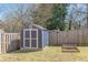 Storage shed with a garden and fenced perimeter in backyard at 1303 Hill Se St, Atlanta, GA 30315