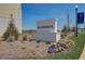 SilverRock community entrance with colorful flowers and sunny sky at 525 Rubato Knl, Mcdonough, GA 30253