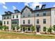 Attractive townhome complex with varied architectural styles, neat landscaping, and a welcoming facade at 525 Rubato Knl, Mcdonough, GA 30253