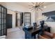 Well-appointed home office with a stylish desk, lighting, and decor, offering a comfortable workspace at 525 Rubato Knl, Mcdonough, GA 30253