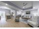 Open living space with staircase, view of the kitchen and comfortable seating arrangements at 1021 Wetherby Way, Alpharetta, GA 30022
