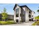 Stunning modern two-story home with black trim and a well-manicured lawn and dark gray exterior at 219 Howell Se Dr # A, Atlanta, GA 30316