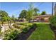 Inviting front yard with lush greenery, manicured shrubs, and a decorative fence enhancing curb appeal at 219 Howell Se Dr # A, Atlanta, GA 30316