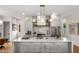 Modern kitchen with quartz countertops, stainless steel appliances, and a large island, ideal for gatherings at 219 Howell Se Dr # A, Atlanta, GA 30316