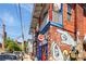 Quirky corner restaurant with colorful mural and details, adding character to the neighborhood street at 219 Howell Se Dr # A, Atlanta, GA 30316