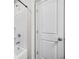 Full bathroom featuring shower-tub and white door at 3181 Meadowstone Sw Ln, Atlanta, GA 30331