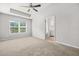 Spacious bedroom with walk-in bathroom and large window allowing natural light to brighten the space at 3181 Meadowstone Sw Ln, Atlanta, GA 30331