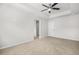 Carpeted bedroom with an adjoining bathroom and closet, promoting convenience and functionality at 3181 Meadowstone Sw Ln, Atlanta, GA 30331