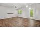 Bright living room with hardwood floors, and natural light, complemented by modern fixtures at 3181 Meadowstone Sw Ln, Atlanta, GA 30331
