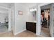 Bathroom features single sink vanity, tile floor and an entrance to the walk-in closet at 3255 Morgan Rd, Buford, GA 30519