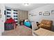Inviting bedroom with stylish decor, a comfortable chair, and a playful fort, perfect for a sanctuary at 3255 Morgan Rd, Buford, GA 30519