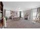 Spacious bedroom featuring a king-size bed, sitting area, and a charming pink desk area at 3255 Morgan Rd, Buford, GA 30519