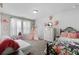 Charming bedroom with cozy decor, bright natural light, and carpet floors at 3255 Morgan Rd, Buford, GA 30519