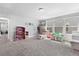 Spacious bonus room with natural light, playroom and seating area at 3255 Morgan Rd, Buford, GA 30519