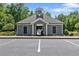 Community clubhouse with well-maintained exterior and ample parking, providing a welcoming gathering space at 3255 Morgan Rd, Buford, GA 30519