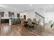 Dining room is conveniently located next to the kitchen and features a wooden table and staircase access at 3255 Morgan Rd, Buford, GA 30519