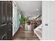 Bright and open foyer leading to a spacious living area with hardwood floors and natural light at 3255 Morgan Rd, Buford, GA 30519