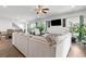 Open-concept living room with hardwood floors and an adjacent dining area at 3255 Morgan Rd, Buford, GA 30519