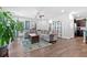 Cozy living room with a large sectional sofa, stylish rug, and bright, natural light at 3255 Morgan Rd, Buford, GA 30519