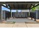Community mailboxes under a black pergola on a sunny day, offering a convenient amenity for residents at 3255 Morgan Rd, Buford, GA 30519