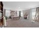 Spacious bedroom features plush carpet, a desk and a large bed with a decorative headboard at 3255 Morgan Rd, Buford, GA 30519