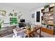 Well-organized office space with desk, printer, and a plethora of shelves at 3255 Morgan Rd, Buford, GA 30519