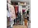 Walk-in closet contains wire shelving and rods for ample storage of clothes and accessories at 3255 Morgan Rd, Buford, GA 30519