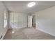 Cozy bedroom featuring carpet, double door closet, and natural light from a window at 3284 Salem Se Ln, Conyers, GA 30013