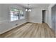 Dining room featuring sleek vinyl flooring, wainscoting, and lots of natural light at 3284 Salem Se Ln, Conyers, GA 30013