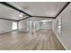 Bright and airy living room featuring sleek vinyl flooring, neutral paint, and modern lighting at 3284 Salem Se Ln, Conyers, GA 30013
