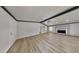 Spacious living room with sleek vinyl flooring, a fireplace, and natural light at 3284 Salem Se Ln, Conyers, GA 30013