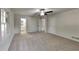 Spacious main bedroom featuring plush carpeting, a ceiling fan, and ample closet space at 3284 Salem Se Ln, Conyers, GA 30013