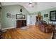 Well-lit living room with vaulted ceiling, hardwood floors, and comfortable seating at 654 Euharlee Five Forks Rd, Kingston, GA 30145