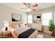 Bright and airy bedroom with a ceiling fan and lots of natural light at 1416 Emerald Pine Ct, Lawrenceville, GA 30043