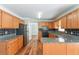 Spacious kitchen with stainless steel appliances, ample granite countertop space, and hardwood floors at 1416 Emerald Pine Ct, Lawrenceville, GA 30043