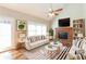 Inviting living room with a fireplace, high ceilings, and lots of natural light at 1416 Emerald Pine Ct, Lawrenceville, GA 30043