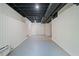 Finished basement with painted walls and ceiling and lots of space at 175 River Run, Roswell, GA 30075