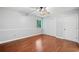 Bedroom featuring a closet and wood floors at 175 River Run, Roswell, GA 30075